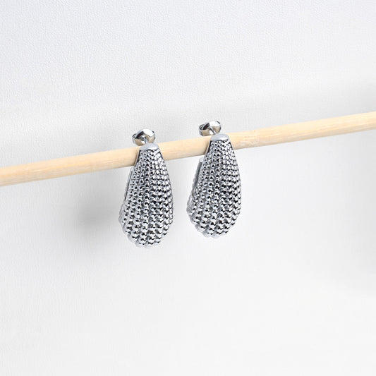 Boucle d'oreilles de rhodium avec texture